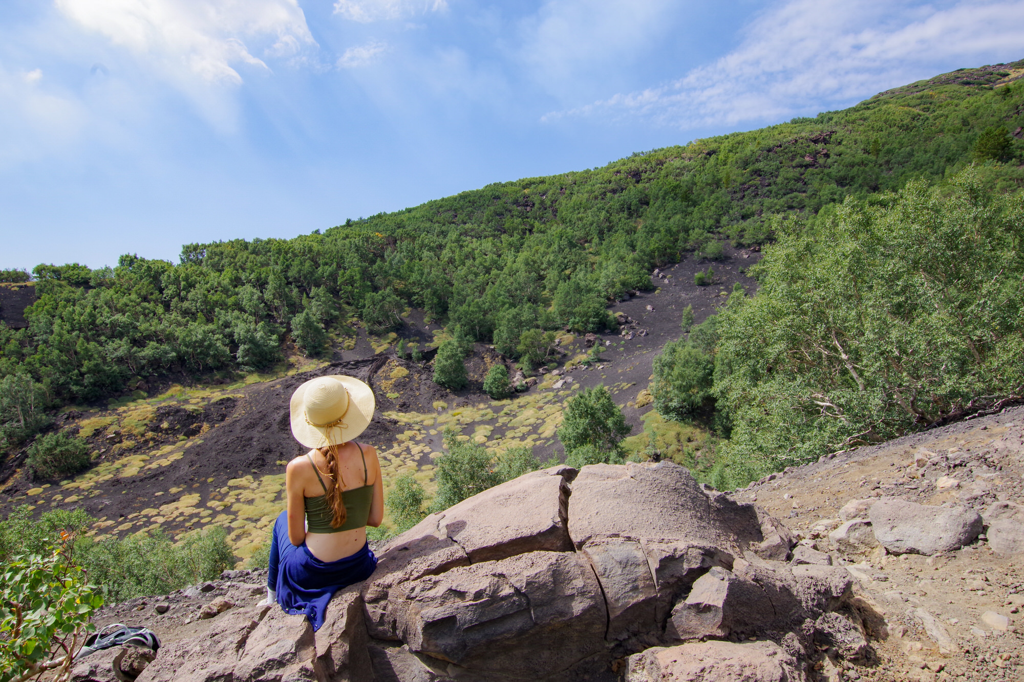 Girl sitting at the Mount Etna Girl sitting at the Mount Etna